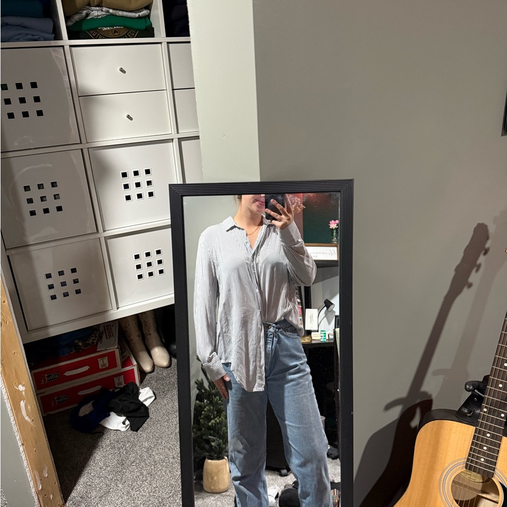 Light Gray Button-Up Shirt and Blue Jeans